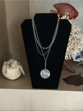 SILPADA S.S. Multi strand necklace with a hammered circle pendant.